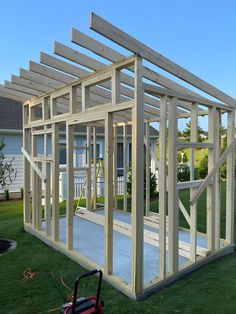 a house being built in the grass