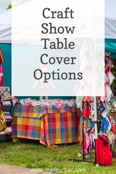 a table covered in colorful cloths under a tent with text overlay that reads craft show table cover options