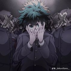 an anime character covers his face with his hands as he stands in front of other characters