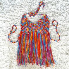 Multi Colored. Essential For Your Bohemian Hippie Closet. Perfect For Festivals. Halter Top Around Neck And Ties In Back. 19 1/2 Inches Long Excluding Neck Ties. Brand New Without Tags. Bohemian Crochet Top With Crochet Trim For Party, Bohemian Halter Neck Crochet Top For Party, Red Fringe Tops For Summer, Fitted Multicolor Crochet Halter Neck Top, Bohemian Crochet Tops For Party, Multicolor Fitted Halter Neck Crochet Top, Multicolor Crochet Halter Top For Summer, Fitted Multicolor Crochet Top With Crochet Trim, Spring Festival Red Halter Top