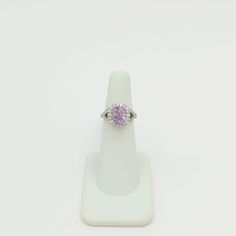 Beautiful light purple 3.53 ct. spinel cushion with 0.84 ct. good quality white diamond rounds.  Handmade in platinum.  Ring size 4.25.  Metal: Platinum Stone: Diamond,Spinel Stone Cut: Cushion Cut  Dimensions reference the ring size and are not specific to the ring itself. Exact ring dimensions are not provided. Please reach in the seller Q&A for questions. Cushion Cut Pink Sapphire Jewelry, Pink Sapphire Cushion Cut Fine Jewelry Ring, Fine Jewelry Pink Sapphire Cushion Cut Ring, Formal Pink Sapphire Rings With Cushion Cut, Pink Sapphire Cushion Cut Rings, Formal Pink Sapphire Cushion Cut Rings, Oval Pink Sapphire Jewelry With Halo Setting, Fine Jewelry Pink Sapphire Ring In Purple, Cushion Cut Pink Sapphire Gemstone Jewelry