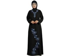 Party Wear  -A-line Abaya with floral embroidery patterns. -Designer neck with beautiful machine hand embroidery. -Matching embroidery floral motif pattern in front. -Matching Square Hijab (100*100 cm) and Band Included. Color: Black Fabric: Kashibo (polyester) Care: Dry Clean Please Note: All care has been taken for on screen color resemblance of the garments, however 5% variation may be accepted as different monitor capabilities. Black Thobe With Floral Embroidery And Long Sleeves, Black Long Sleeve Thobe With Floral Embroidery, Traditional Black Abaya With Floral Embroidery, Black Long Sleeve Abaya With Floral Embroidery, Traditional Black Long Sleeve Khimar, Black Embroidered Abaya For Wedding, Black Embroidered Wedding Abaya, Wedding Black Embroidered Abaya, Traditional Niqab For Eid