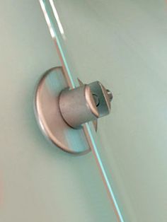 a close up view of a bathroom door handle