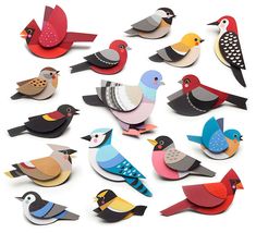 a group of paper birds sitting on top of each other