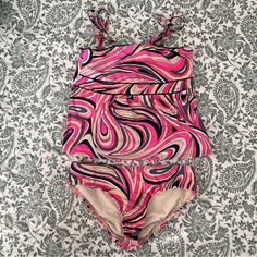 Juicy Couture Girls Swimsuit. 2-Piece Tankini In Bold Colorful Pattern. Adjustable Straps. Like New Condition (Possibly Never Worn) Size 14 Fitted Playful Tankini, Pink Swimming Sets For Beachwear, Pink Beachwear Sets For Swimming, Fitted Tankini For Playwear And Beachwear, Fitted Multicolor Playwear Sets, Fitted Playful Pink Tankini, Pink Beachwear Sets For Pool, Fitted Beachwear Sets For Playwear, Fitted Beachwear Playwear Set