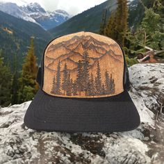 Burned Cork Trucker Hat using Pyrography techniques. Each Hat is an Original. Cork is naturally water (and wine) resistant. But I’ve added an extra sealer on top. Each Cork Hat comes with a Signature Piper Market Bag. Brown Flat Bill Hat For Camping, Adjustable Brown Hat For Hiking, Brown Curved Brim Trucker Hat For Hiking, Brown Trucker Hat With Curved Brim For Hiking, Brown Camping Hat, One Size Fits Most, Brown Flat Bill Snapback Hat For Hiking, Brown Hiking Cap, Brown Snapback Hat For Travel, Brown Curved Brim Trucker Hat For Adventure