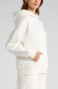 The brand's cushy cotton-rich fleece makes this hoodie as soft as a cloud, and you'll find you're still wearing it long after you've left the gym. 25 1/2" length (size Medium) Fixed hood Ribbed cuffs and hem Kangaroo pocket 60% cotton, 40% polyester Machine wash, tumble dry Imported Oversized White French Terry Hoodie, Sporty Hooded Hoodie With Soft Texture, Cozy Sweatshirt With Drawstring Hood For Everyday, White Relaxed Fit Hoodie In French Terry, Cozy French Terry Sweatshirt With Double-lined Hood, Cream Hoodie With Kangaroo Pocket For Loungewear, Cozy Fit Sweatshirt With Drawstring Hood, White French Terry Sweats For Loungewear, Comfy Relaxed Fit Hoodie With Soft Texture