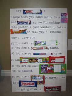 a bulletin board with candy bars on it and some words written in front of it