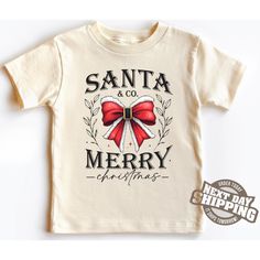 -Santa & Co Merry Christmas Toddler Shirt, Kids Christmas Shirt, Cute Vintage Santa Gift, Christmas Gift Shirt, Christmas Gift 2025 Welcome to LittleLambsLounge! -Our products come in 3 types: onesie® bodysuit, toddler, and youth size shirt. -The monthly sizes you choose will come as bodysuit® onesie®, available in both long sleeve and short sleeve options. We take pride in offering a delightful range of clothing for your little ones, crafted from super-soft fabrics that both you and your baby will adore. Our commitment is evident in every thread, as each piece is sustainably handmade-to-order, accompanied by a certificate of authenticity. FEATURES: We prioritize your kids' comfort! Our garments are made from ethically sourced ultra-soft fabrics and printed with safe, eco-friendly inks. Ev Kids Christmas Shirt, Christmas Toddler, Christmas Shirts For Kids, Christmas Onesie, Long Sleeve And Shorts, Toddler Christmas, Santa Gifts, Vintage Santa, Vintage Santas