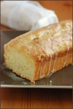 a close up of a piece of bread on a plate with a napkin in the background