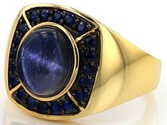 11x9mm 6.00ct oval cabochon blue Star sapphire with .90ctw round blue sapphire 18k yellow gold over sterling silver ring. Measures approximately .66"L x .71"W. Not sizeable. Finished under gallery. Web only Gold Sapphire Ring Oval Cabochon With Polished Finish, Fine Jewelry Sapphire Ring With Oval Cabochon, Gold Sapphire Ring With Gemstone Accents, Oval Cabochon Sapphire Ring With Polished Finish, Luxury Oval Cabochon Sapphire Ring As Gift, Vintage Yellow Gold Sapphire Jewelry, Oval Cabochon, Gold Oval Cabochon Sapphire Ring Fine Jewelry, Yellow Gold Sapphire Jewelry Oval Cabochon, Luxury 14k Stamped Round Sapphire Ring