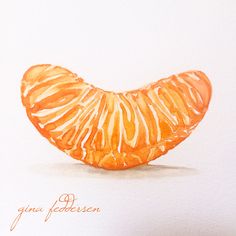 an orange cut in half sitting on top of a white tablecloth with writing underneath it