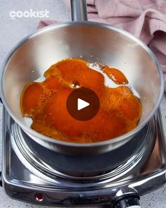 an image of food cooking in a pan on the stove