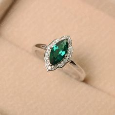 Green Emerald Ring May Birthstone Marquise Cut Sterling | Etsy Marquise Cut Emerald Ring In White Gold For Wedding, Elegant Marquise Emerald Ring, White Gold Emerald Ring Marquise Cut For Wedding, White Gold Marquise-cut Emerald Wedding Ring, White Gold Emerald Wedding Ring With Marquise Cut, Green Marquise Emerald Rings, Green Marquise Emerald Diamond Ring, Marquise Emerald Diamond Ring In Green, Marquise Emerald Diamond Ring