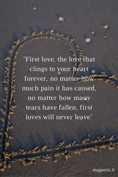 a heart drawn in the sand with a quote about love