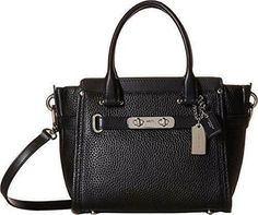 Coach 37444 Swagger 21 Pebble Leather Satchel Carryall Bag Black, new with tags. Bright color lends the Swagger 21 a pretty sophistication for spring. This charmingly petite version of a coveted silhouette is finished by hand in plump pebble leather with polished hardware, and a long strap that snaps on with ease for hands-free wear. * SV/Black color * Beautiful Coach black color pebble leather with silver color hardware * Measures approximately 8" (L) x 6.5" (H) x 4" (W) - bottom measures about Wedding Clutch Purse, Pink Shoulder Bags, Black Leather Satchel, Leather Coach, Coach Swagger, Carry All Bag, Satchel Handbags, Coach Swagger Bag, Cute Bags