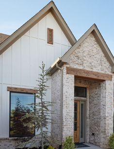 a house with a tree in front of it