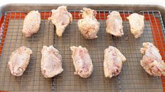 raw chicken on a baking sheet ready to be cooked and put in the oven for cooking