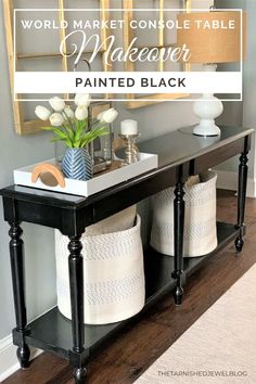 a console table painted black with the words world market console table makeover over it