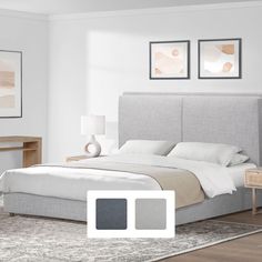 a bedroom with white walls and gray bedding in the center, two framed pictures on the wall