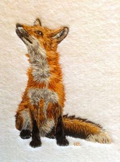 a drawing of a fox sitting in the snow