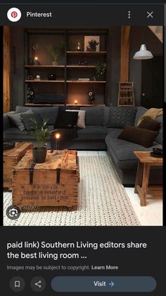 a living room filled with lots of furniture and a wooden box sitting on the floor