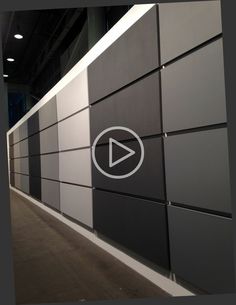 a wall that has some kind of play button on it