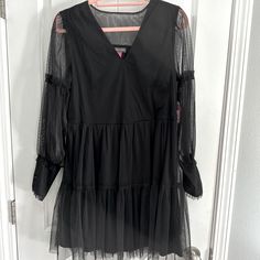 Brand New With Tads Short Black Dress Size Xs Black Sheer V-neck Midi Dress, Black Mini Dress With Sheer Sleeves And V-neck, Black Long Sleeve Mini Dress For Brunch, Black V-neck Dress With Sheer Sleeves, Casual Black Sheer Dress, Black Sheer Mini Dress For Spring, Sheer Black Mini Dress For Spring, Black Sheer Dresses For Spring, Black Sheer Dress For Fall