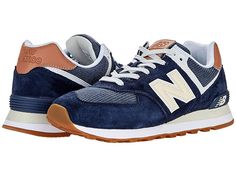 New Balance Classics ML574v2 - Men's Running Shoes : Indigo/Faded Mahogany : Add a vintage runner design to your wardrobe with the iconic silhouette of the New Balance Classics ML574v2 sneakers. Casual shoes with suede and mesh or textile uppers in a sporty silhouette. Foam-padded collar and tongue. Soft linings and a removable foam insole provide all-day comfort. Traditional lace-up closure. TPU heel insert for extra support. ENCAP® midsole for cushioning. Durable rubber outsole. Imported. Meas Suede Running Shoes With Boost Midsole For Streetwear, Suede Running Shoes With Rubber Waffle Outsoles, Suede Running Shoes With Rubber Waffle Outsoles For Sports, Casual Suede Running Shoes For Streetwear, Suede Running Shoes With Boost Midsole For Jogging, Suede Running Shoes With Boost Midsole, High-top Suede Running Shoes For Sports, Sporty Suede Running Shoes For Streetwear, Sporty Suede Sneakers For Jogging