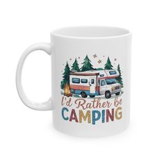 a white coffee mug with an rv camper on it and the words i'd rather be camping