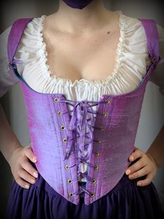 "Our classic Ren Faire bodice constructed in the elegant silk color of your choice! Add a matching mask to make it a set! (convo us to add this!) This corset bodice is made of two layers: your choice of silk lined with a cotton coutil inside. It laces up for easy adjustability at the center front and the back. It comes with a set of sturdy white or black cotton laces or matching ribbons by request. (Added fee for matching ribbons) The straps have adjustable ties at the front. We use 5/16\" steel Ren Faire Bodice, Ren Faire Costume, Victorian Corset, Corset Costumes, Festival Skirts, Festival Costumes, Overbust Corset, Corset Bodice, Corset Lingerie