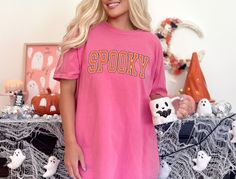 👻 Spooky - Comfort Colors Unisex TShirts 👻 Get ready for all things spooky with our "Spooky" shirt! Perfect for celebrating Halloween and embracing the eerie vibes. Features: Spooky "Spooky" design with a touch of eerie charm 🎃🕸️ Soft and comfy fabric for hauntingly good comfort 👕 Ideal for Halloween parties, haunted houses, or just getting into the spirit of the season 👻🦇 Embrace the spooky season with style! #SpookySeason #HalloweenFashion #EerieVibes #SoftAndComfy #HauntinglyGood #Chic Spooky Spooky, Lake Girl, Small Town Girl, Spooky Designs, Haunted Houses, Halloween Parties, Halloween Fashion, Unisex Tshirt, Hat Shop