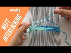 someone is weaving something on a piece of fabric with blue yarn and the words weaving interlocking