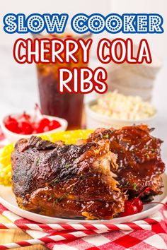 slow cooker cherry cola ribs on a plate with corn and coleslaw in the background