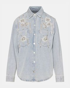 Upgrade your wardrobe with our VENICE denim jacket. This embellished denim shacket features rhinestone florals for a touch of glamour. Crafted with quality and style in mind, this jacket will elevate your outfits and make you stand out. Light wash embellished denim jacket Snap buttons Front pockets Length: 27.25" 75% cotton 24% polyester 1% spandex Hand wash Emma is 5ft 10in and is wearing a size small Imported Casual Denim Jacket With Rhinestones For Spring, Casual Rhinestone Denim Jacket For Spring, Spring Denim Embellished Outerwear, Spring Embellished Denim Outerwear, Spring Denim Jacket With Rhinestones, Embellished Long Sleeve Cotton Denim Jacket, Spring Rhinestone Denim Jacket, Embellished Cotton Denim Jacket, Embellished Cotton Outerwear For Spring