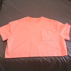 New Without Tags Athleta Women's Classic Crop In Coral, Size M. Such A Fun Color! Thick Cotton Material With Boxy Cut. Casual Crew Neck Crop Top For Sports, Pink Athleisure Tops For Light Sports, Pink Summer Sportswear Tops, Relaxed Fit Solid Tops For Light Sports, Pink Cotton Athleisure Top, Casual Short Sleeve Crop Top For Gym, Relaxed Fit Crew Neck Crop Top For Sports, Cotton Gym Crop Top With Short Sleeves, Pink Sporty Crop Top For Loungewear