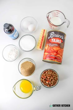 ingredients to make an apple pie laid out on a white counter top with measuring cups