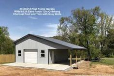 two car garage with attached carport in the yard