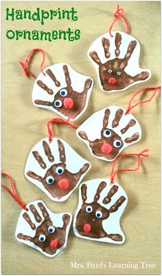 handprint ornaments made with brown paper and red string