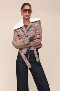 '70s styling gets a modern upgrade with our cropped aviator jacket, which features a wide collar, detachable faux shearling trim, detachable belt, chest patch pockets, and a versatile autumnal plaid print for retro academia vibes. Style #: 83945 Retro Academia, Equestrian Chic, Academia Style, Aviator Jacket, Aviator Jackets, Leather Trench Coat, Leather Dresses, Cropped Jacket, Leather Buckle