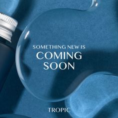 a blue bottle with the words coming soon on it