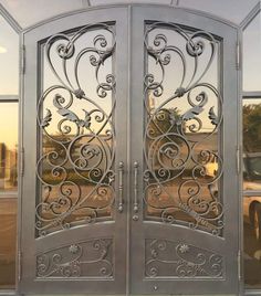 IWD Beautiful Wrought Iron Double Door CID-028 Luxury Scrollwork Arched Top Clear Glass Arched Kickplate Iron Double Door, Iron Front Doors, Wrought Iron Entry Doors, Wrought Iron Front Door, Modern Entry Door, Iron Front Door, Iron Entry Doors, Door Sweep, Steel Windows