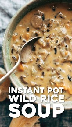 a bowl of wild rice soup with a spoon in it and the title instant pot wild rice soup