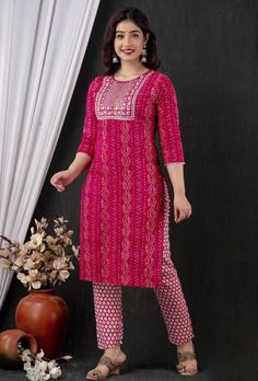 Summer collection kurti pant suit. 3 piece set . Fabric : Reyon fabric kurti , georgette Dupatta with Zari lining, rayon pants. Work : Printed base , border work with Zari lace. Sequence work . Measurement : Kurti length 44in , pant 38 length, Dupatta 2.10 meters, Unstitched Pink Sets With Printed Motifs, Pink Cotton Kurta With Dabka Work, Pink Straight Kurta Sets With Dabka Detail, Pink Straight Kurta Set With Dabka, Elegant Pink Cotton Palazzo Set, Pink Fitted Straight Kurta Set, Pink Straight Kurta Lawn Suit With Self Design, Elegant Pink Cotton Anarkali Set, Pink Self-design Lawn Suit For Navratri