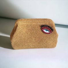 Crochet Evil Eye Brooch Raffia Pouch Clutch Bag |Woven Straw Bag | Beach Clutch Purse 🏷️By purchasing this handmade product, you support women's employment and contribute to sustainable fashion🛍️ 📌100% handmade eco-friendly clutches with comfortable use, stylish design, style beyond trends ✅A stylish women's accessory for everyday use, special occasions! A nice and comfortable holiday, beach bag 🌟Lightweight eco-friendly clutches that you can use in every area from daily use, weddings, invit Rectangular Woven Straw Bag, Woven Straw Bag As Fashion Accessory, Gold Rectangular Beach Clutch, Gold Clutch Straw Bag For Beach, Gold Clutch Straw Bag For The Beach, Gold Straw Clutch Bag For The Beach, Handmade Handheld Pouch, Gold Bohemian Pouch, Handheld Travel Pouch Handmade