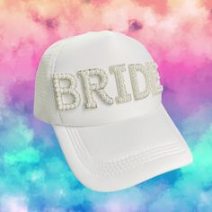 Looking for the perfect accessory for your bachelorette party or wedding weekend? Look no further than our collection of stylish and practical white baseball caps!  With options for brides, bridesmaids, and the whole tribe, our caps are the perfect way to celebrate your special day and make a statement wherever you go! Our white bride baseball cap is the perfect way to show off your new title and make sure everyone knows you're the center of attention. Made with high-quality materials and attention to detail, this cap is both stylish and durable, with a classic design that will never go out of style. For the rest of your tribe, we offer a stylish tribe baseball cap that's perfect for celebrating your friendship and showing off your group pride. With its eye-catching design and high-quality White Cap Mini Hat For Weddings, White Snapback Trucker Hat For Party, White Trucker Baseball Cap For Party, Adjustable White Mini Hats For Bachelorette Party, White Adjustable Baseball Cap For Party, Bachelorette Party Adjustable Trucker Hat, White Adjustable Hat For Bachelorette Party, Adjustable Trucker Cap For Bachelorette Party, Adjustable Trucker Hat For Bachelorette Party