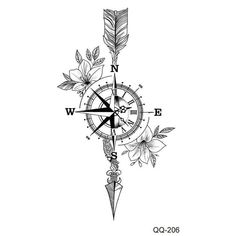 a black and white drawing of a compass with flowers