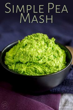 a bowl filled with green pea mash on top of a purple cloth