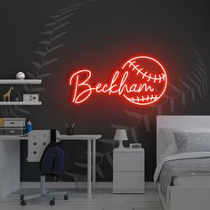 a bedroom with a bed, desk and neon sign that says behan on the wall