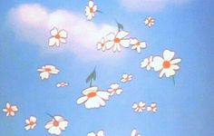 there are many flowers flying in the sky